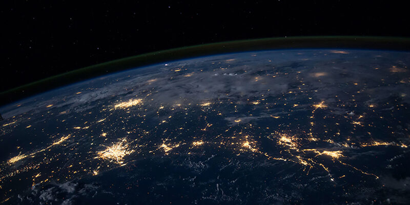Night view of Earth with cities illuminated in lights
